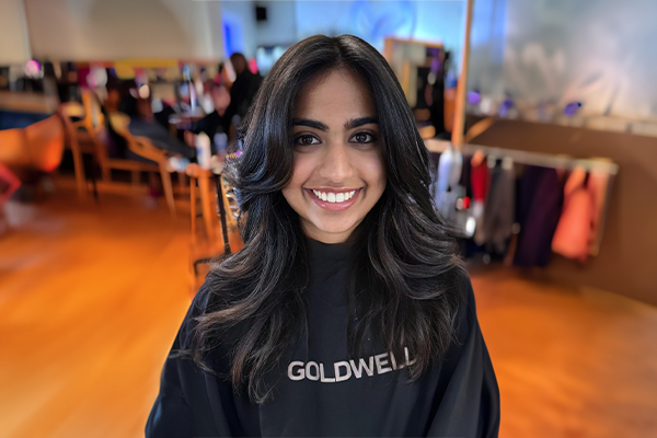 Woman receiving a professional haircut at HB Beauty salon in Kitchener-Waterloo, showcasing precision styling and expert technique